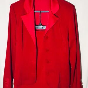 Women’s 2 piece Red suit. Jacket/skirt size 11/12..by Suits Us